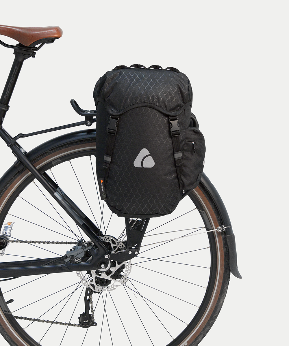 bike bags made from recycled fish nets PUFFER CROSSBODY BAG These market bags are handwoven from discarded fishing nets that wash up on the shores of Sri Lanka 7 Best Bike Panniers of